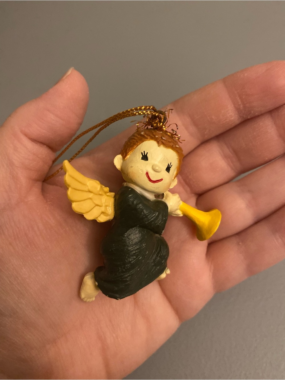 Vintage Handheld Angel Ornament with Yellow Wings and Trumpet